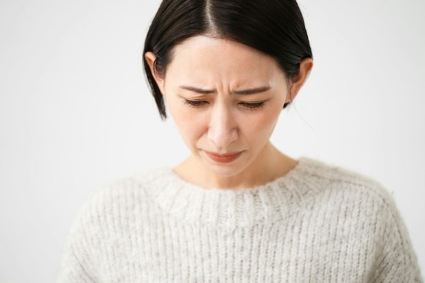 女性　謝罪